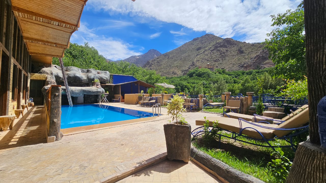Mountain-view pool at Riad Jnane Imlil in the High Atlas
